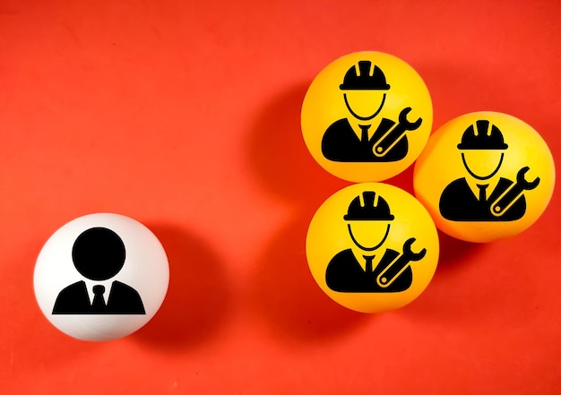 Employer and woker icon on ping pong ball on a red backgroundBusiness management concept