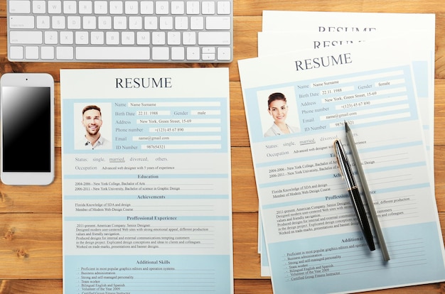Employer workplace with resumes