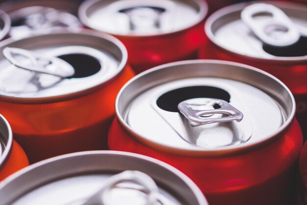 Empty aluminium drink cans recycling background concept