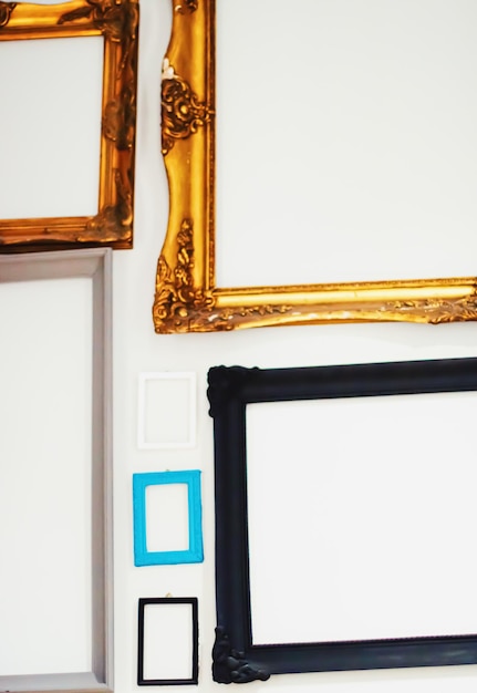 Photo empty art frames on gallery wall decor and design