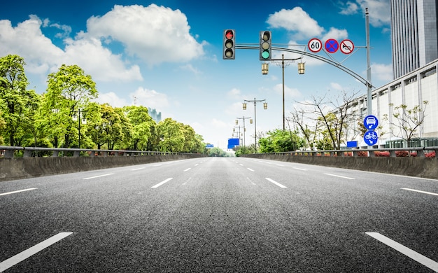 Photo empty asphalt road through modern city in china.