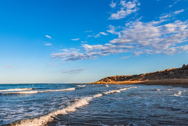 Empty beach with small waves