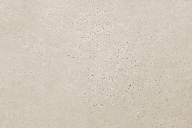 Empty beige background texture rough surface with speckle pattern