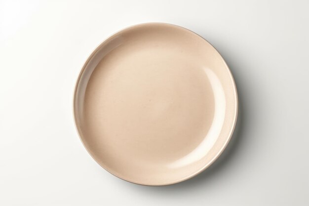 Empty beige plate on white background