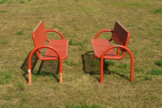 Photo empty benches on field