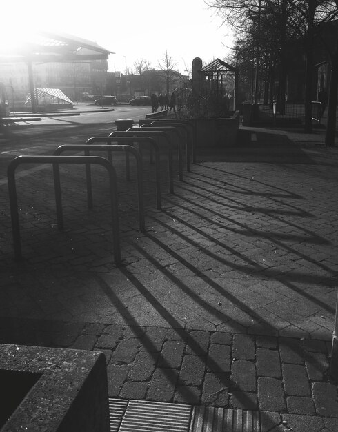 empty bicycle parking railing in sidewalk