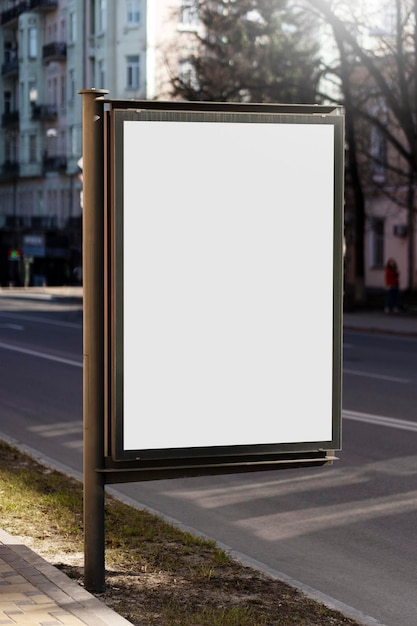 Empty billboard on city street Place for advertising copy space mockup