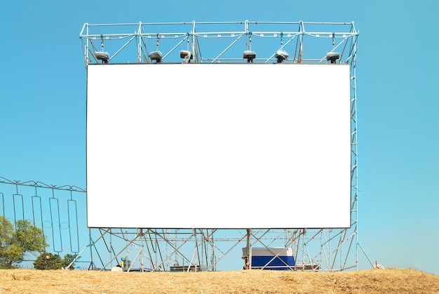 Empty billboard with the blue sky background