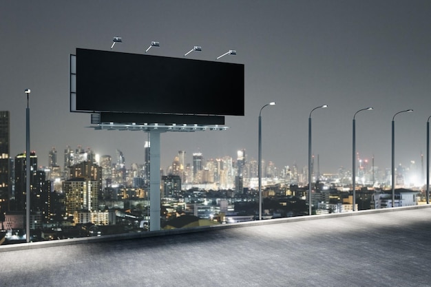 Empty black billboard on night city background