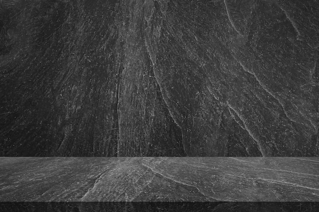 Photo empty black marble table top with black stone wall texture background