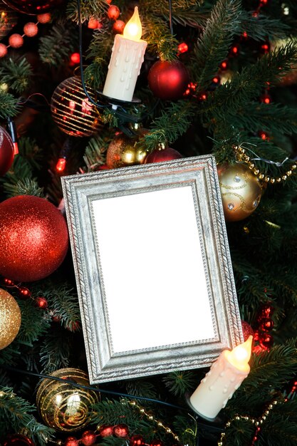 Empty blank photo frame with toys and candle lights