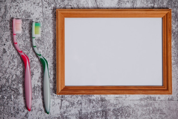 Empty boho style photo frame on concrete