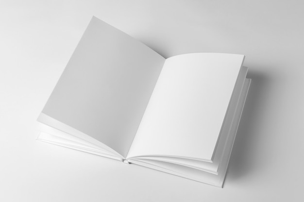 Empty Book Template on White Background hands Open book with blank pages Mock up for design