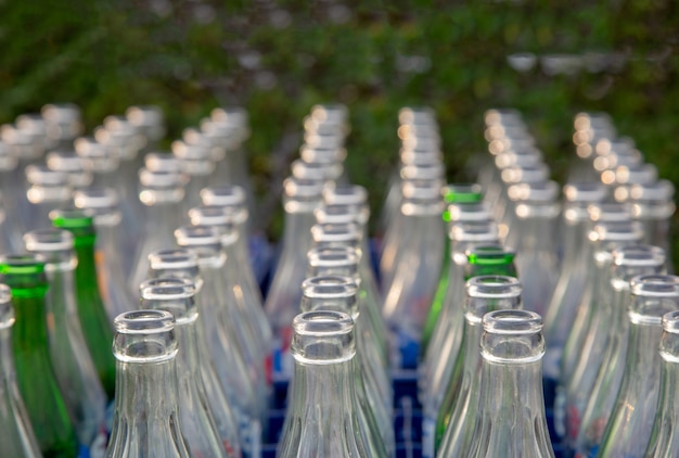 Empty bottle glass with soda drink