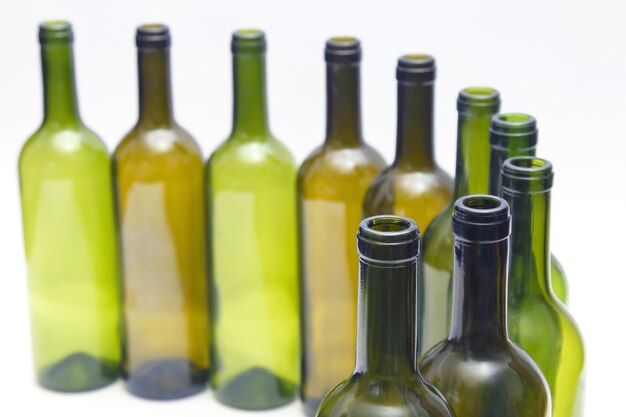 Empty bottles of wine on white background. tableware for drinks