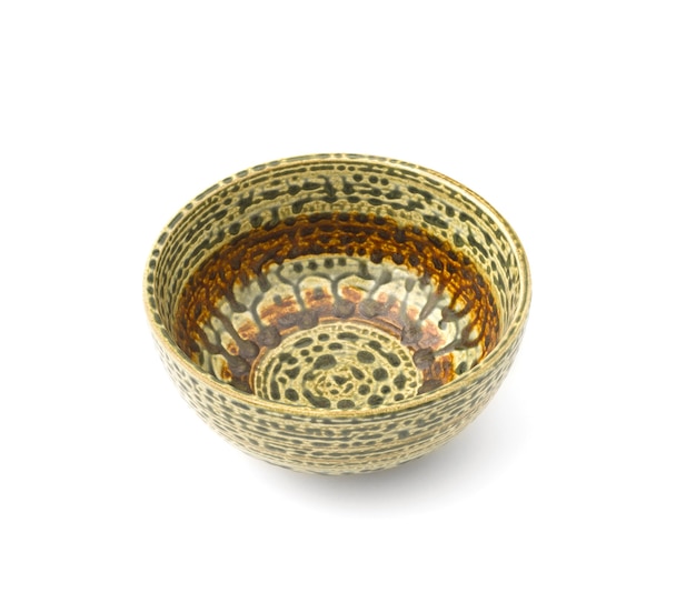 Empty bowl on white background