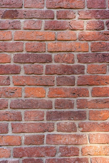 Empty brick red wall background of a old brick house