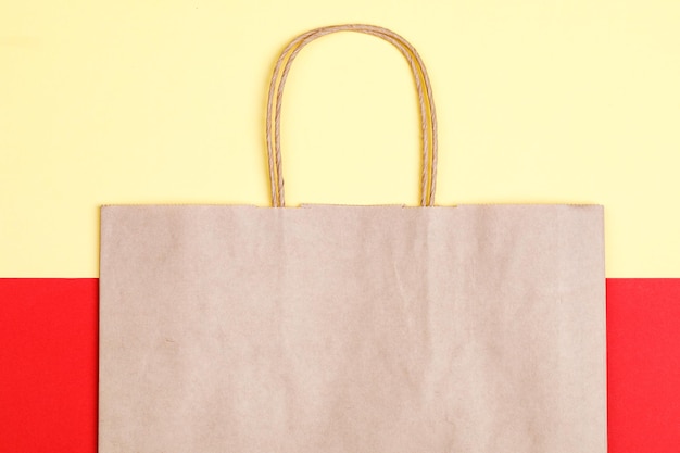 Empty brown paper shopping bag with Handles