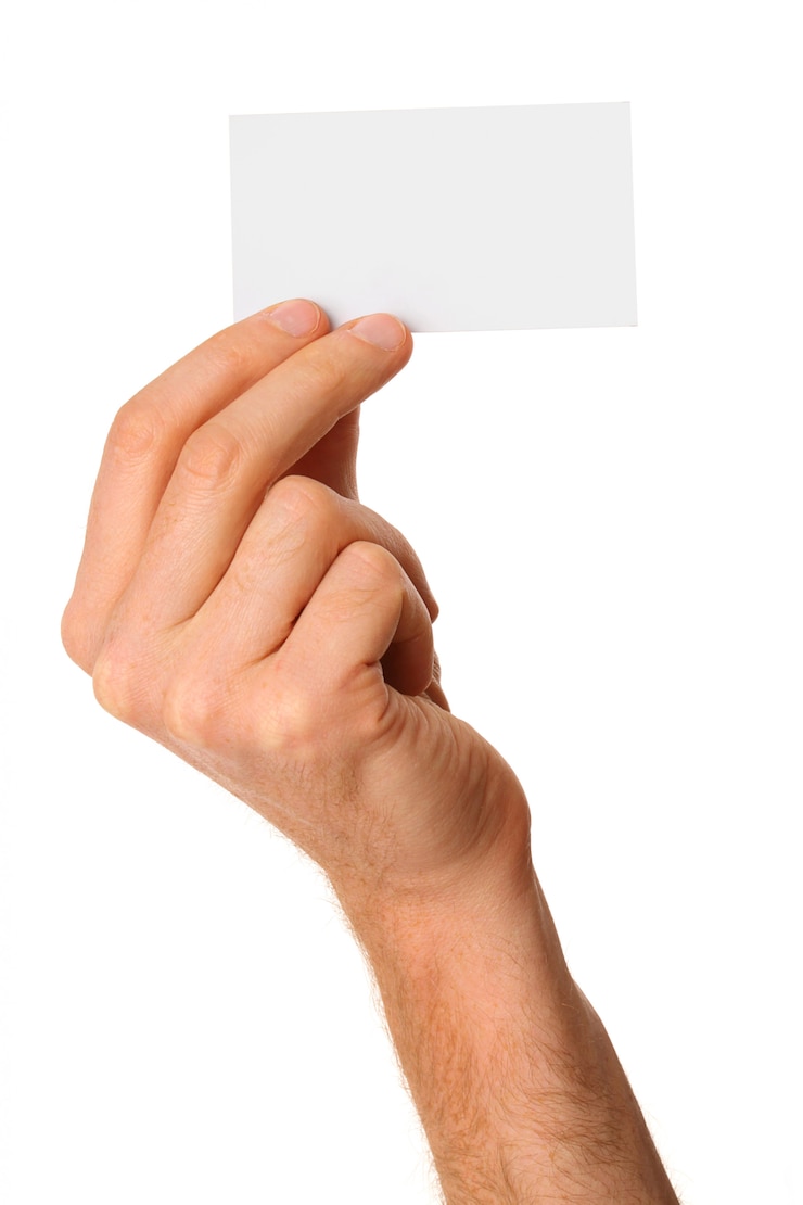 Photo empty business card in a male hand