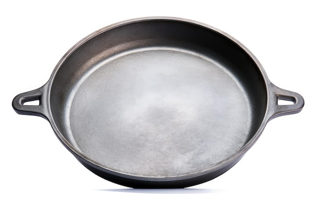 Empty cast iron skillet isolated on white with clipping path Side view