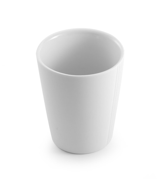 Empty ceramic cup on white surface