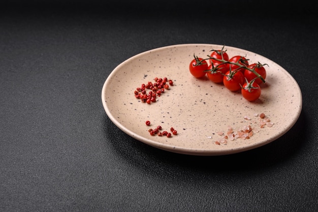 Empty ceramic plate on a dark textured background Preparing kitchen utensils for a family dinner