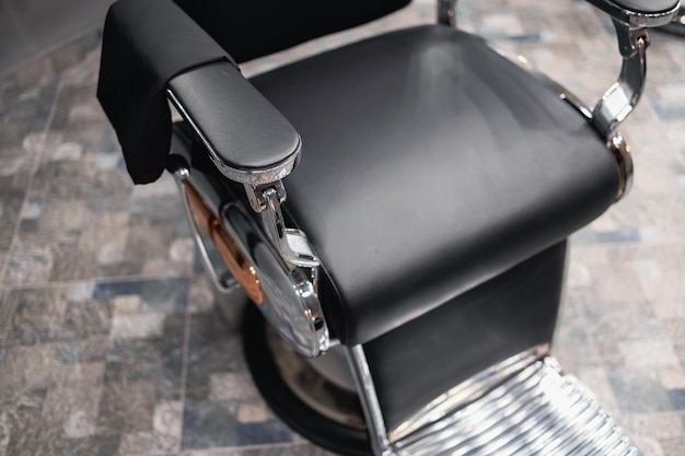 Empty chair at barber shop