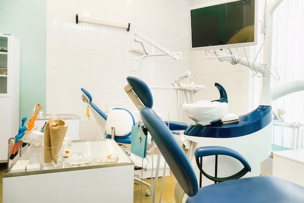 An empty chair in the dentist's office. Empty dentist's office.