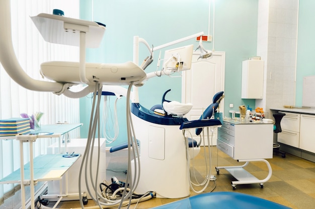 an empty chair in the dentist's office. empty dentist's office