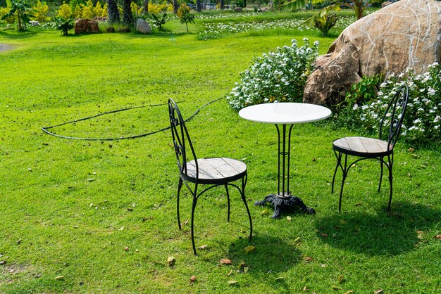 empty chair and table decorated in garden