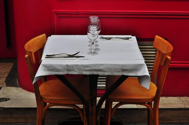 Empty chairs by table