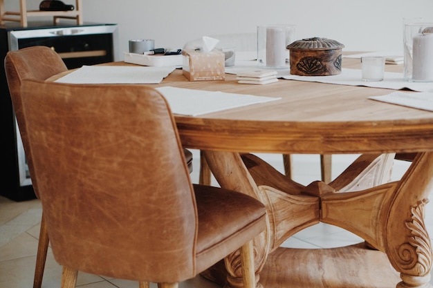 Empty chairs and dining table at home