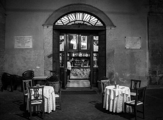 Empty chairs at an old restaurant