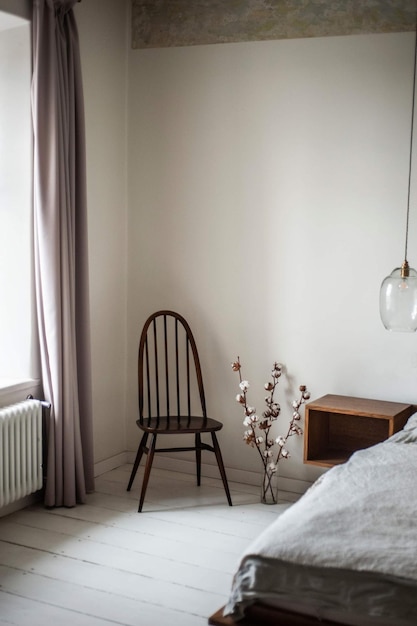 Empty chairs and table against wall at home