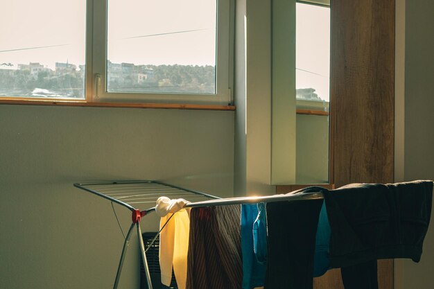 Empty chairs and tables by window