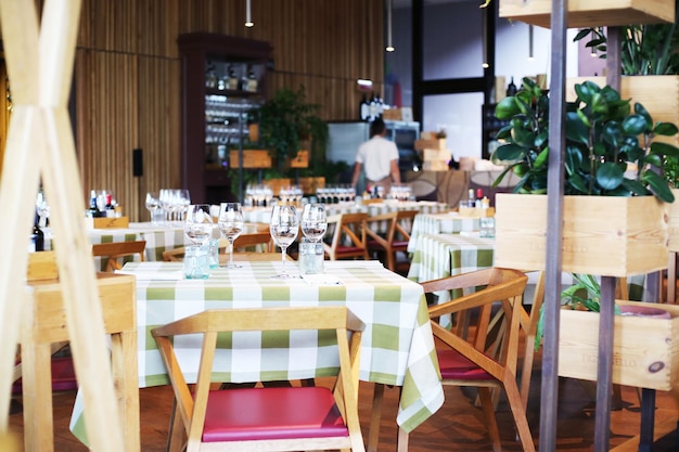 empty chairs and tables in cafe
