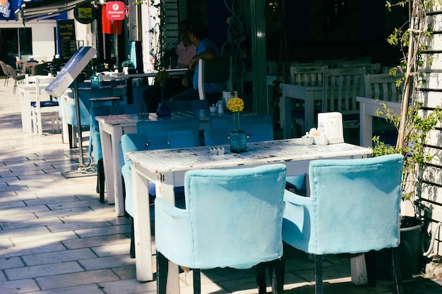 Empty chairs and tables in restaurant