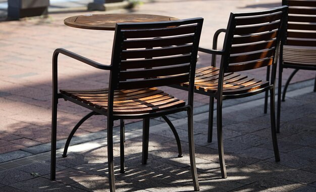 Empty chairs and tables in restaurant