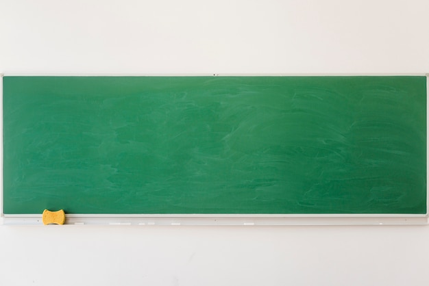 Photo empty chalkboard in classroom in school