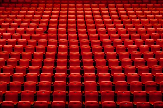 Empty cinema hall with red seats movie theatre neural network ai generated