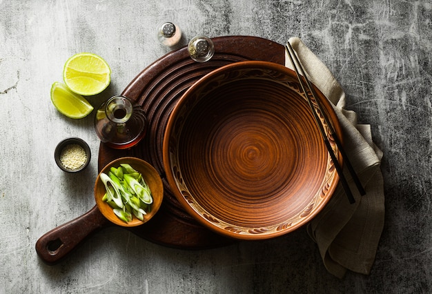 Empty clay dishes. serving set on the table