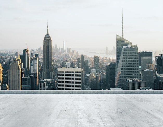 Empty concrete dirty rooftop on the background of a beautiful\
ny city skyline at daytime mock up