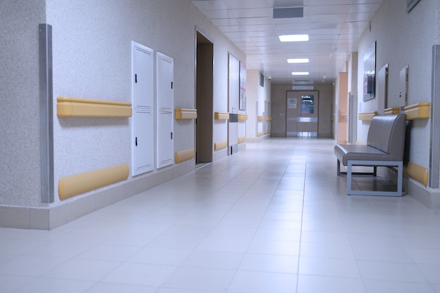 Empty corridor in modern medical clinic background