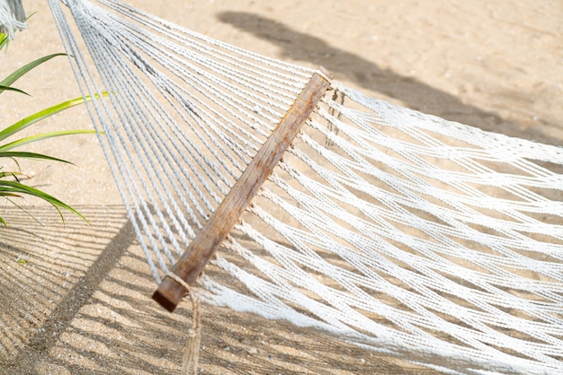 empty cradle with sea beach background