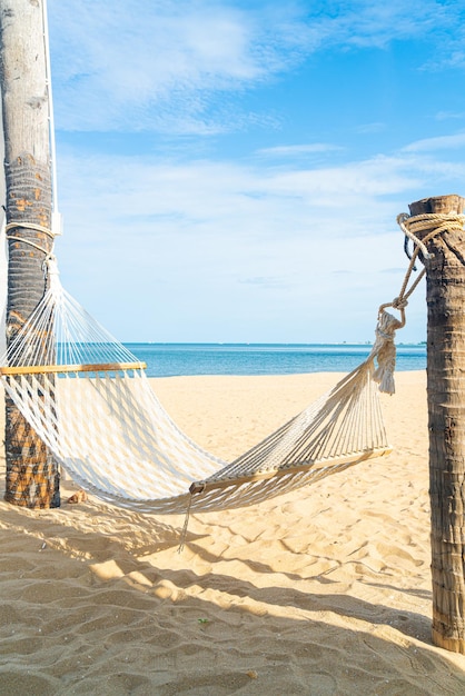 empty cradle with sea beach background