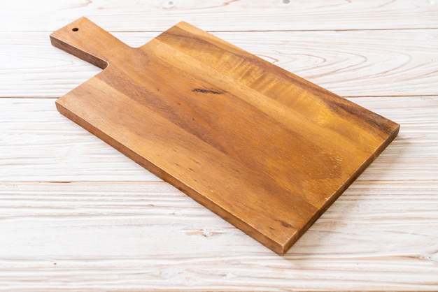 empty cutting wooden board with kitchen cloth