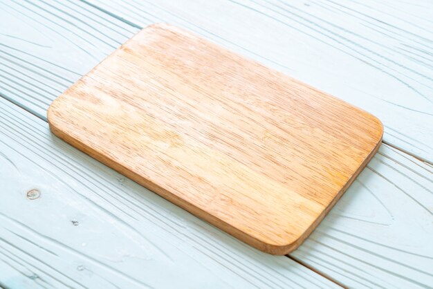 empty cutting wooden board with kitchen cloth