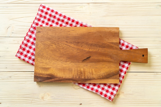 empty cutting wooden board with kitchen cloth