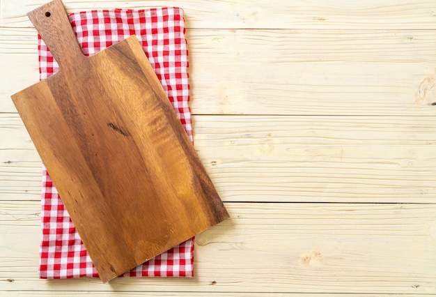 empty cutting wooden board with kitchen cloth