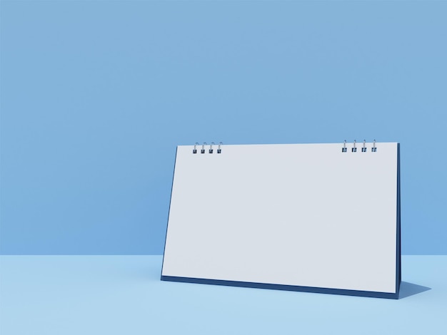 Empty desk calendar, on blue background, 3D rendering.